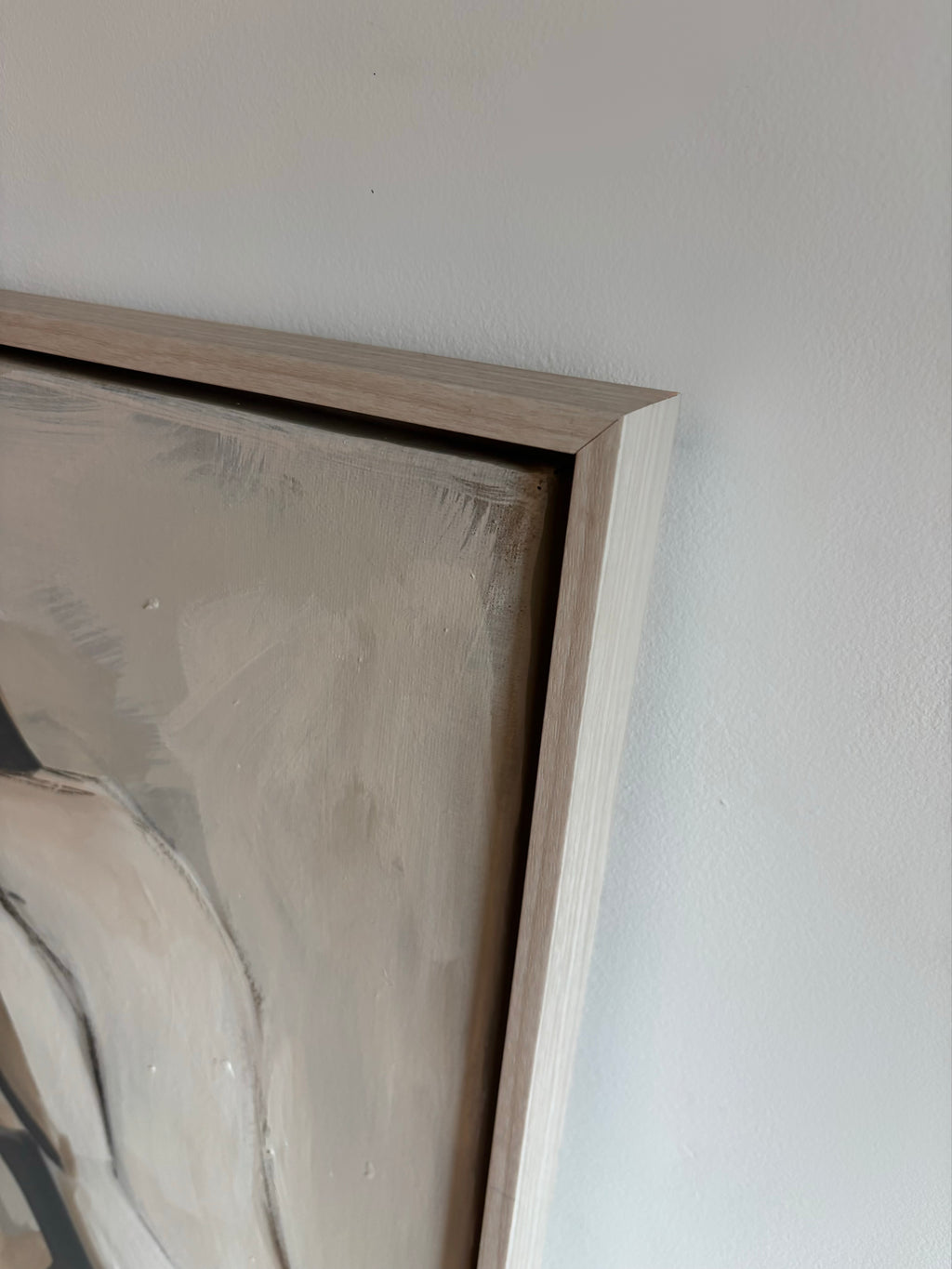 Close-up of a framed painting on a white wall -Neutral contemporary abstract large figurative painting.
Bespoke artwork
Commissioned artwork
Custom Artwork
Custom painting for home
Hand painted wall art
Large original paintings for living room
Large statement artwork
Bespoke abstract art
Bespoke art for interiors
Original paintings for living room
Original art for interiors
Custom artwork for interior designers
Luxury wall art for interiors
Artwork for interior Designers
