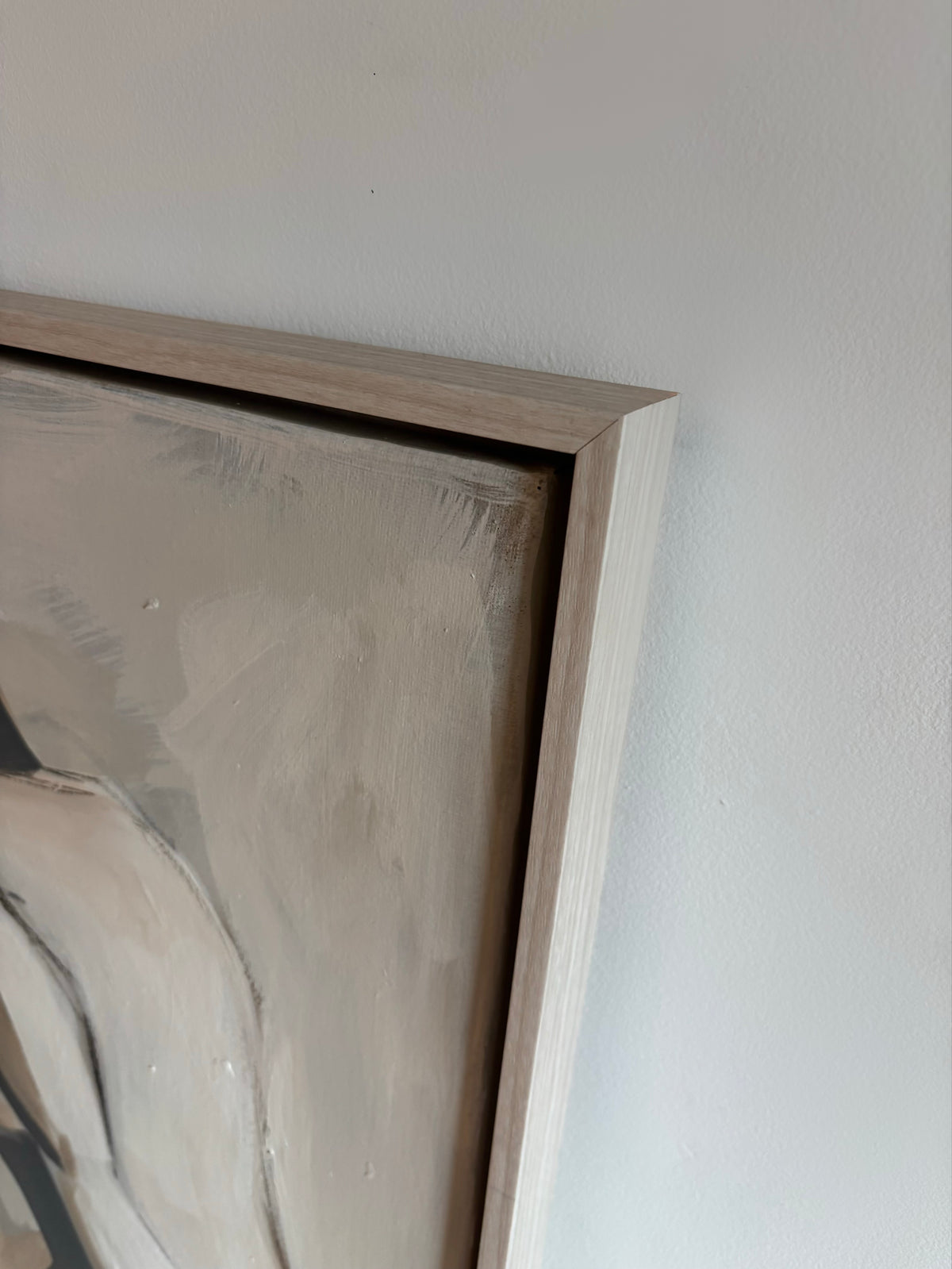 Close-up of a framed painting on a white wall -Neutral contemporary abstract large figurative painting.
Bespoke artwork
Commissioned artwork
Custom Artwork
Custom painting for home
Hand painted wall art
Large original paintings for living room
Large statement artwork
Bespoke abstract art
Bespoke art for interiors
Original paintings for living room
Original art for interiors
Custom artwork for interior designers
Luxury wall art for interiors
Artwork for interior Designers
